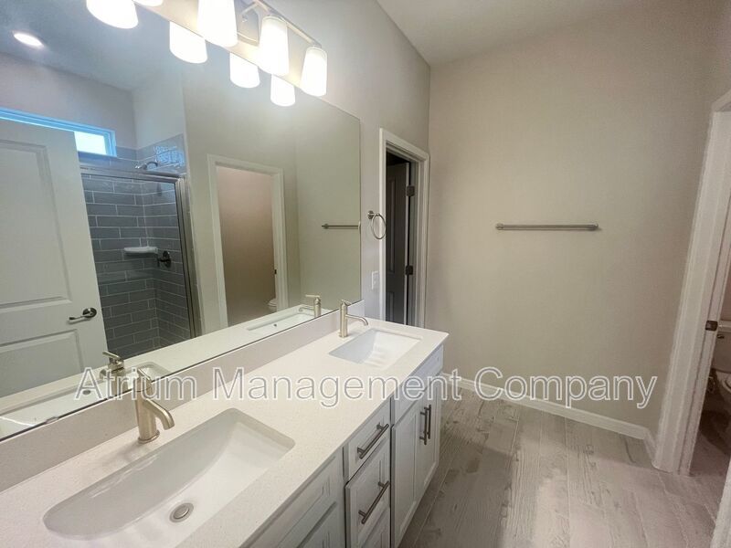 Welcome to this BRAND NEW 4-bedroom, 2-bathroom home located in the community of Canopy Terrace property image