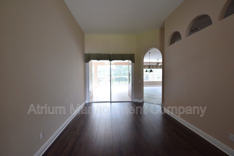 Spacious 4 Bed, 4 Bath + Bonus Room Gated Pool Home in Lake Mary, FL – Magnolia Plantation property image