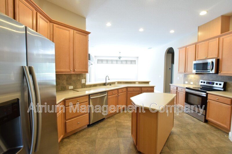 Spacious 4 Bed, 4 Bath + Bonus Room Gated Pool Home in Lake Mary, FL – Magnolia Plantation property image