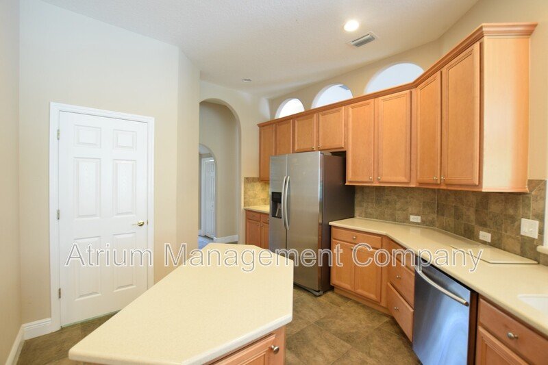 Spacious 4 Bed, 4 Bath + Bonus Room Gated Pool Home in Lake Mary, FL – Magnolia Plantation property image