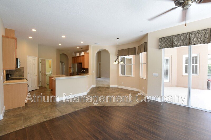 Spacious 4 Bed, 4 Bath + Bonus Room Gated Pool Home in Lake Mary, FL – Magnolia Plantation property image