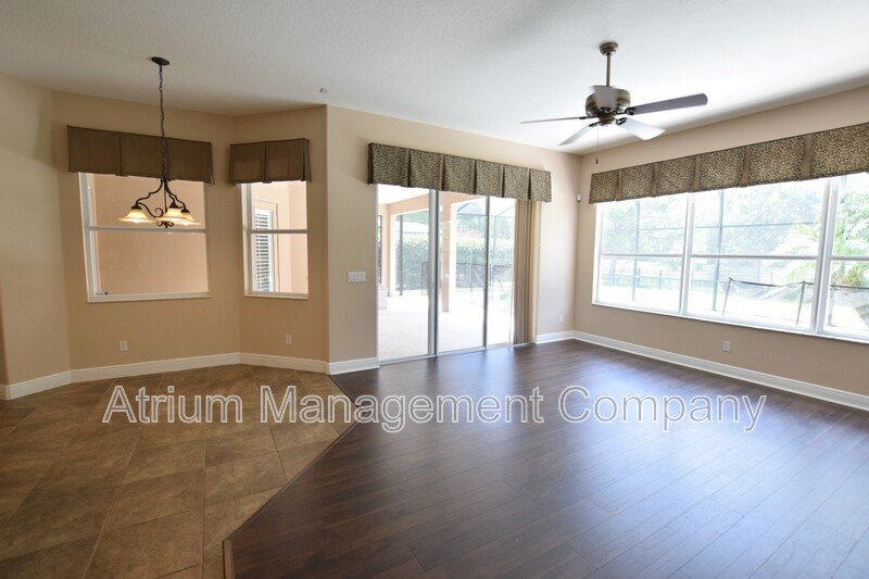 Spacious 4 Bed, 4 Bath + Bonus Room Gated Pool Home in Lake Mary, FL – Magnolia Plantation property image