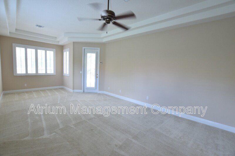 Spacious 4 Bed, 4 Bath + Bonus Room Gated Pool Home in Lake Mary, FL – Magnolia Plantation property image