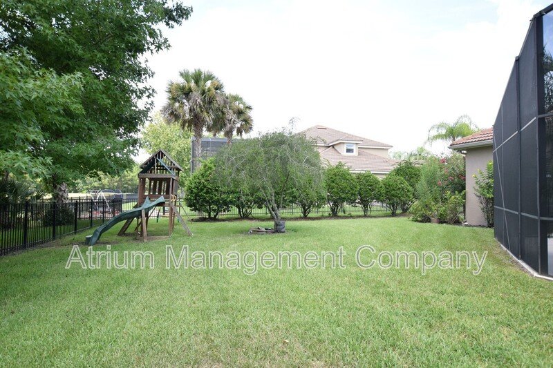 Spacious 4 Bed, 4 Bath + Bonus Room Gated Pool Home in Lake Mary, FL – Magnolia Plantation property image