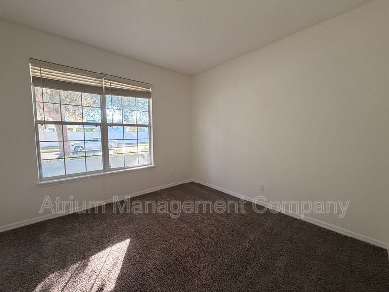 Charming 3BR Winter Garden Home | Spacious Layout, Preserve View & Screened Patio property image