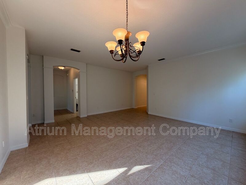 Charming 3BR Winter Garden Home | Spacious Layout, Preserve View & Screened Patio property image