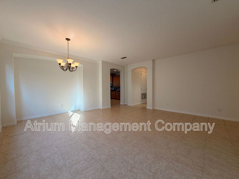 Charming 3BR Winter Garden Home | Spacious Layout, Preserve View & Screened Patio property image