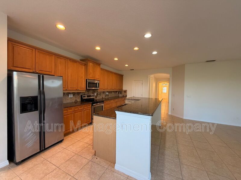 Charming 3BR Winter Garden Home | Spacious Layout, Preserve View & Screened Patio property image