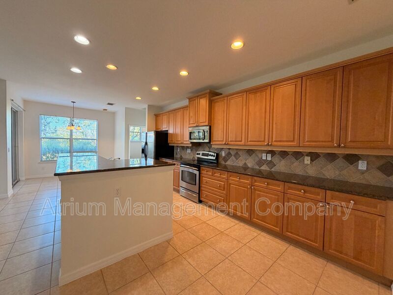 Charming 3BR Winter Garden Home | Spacious Layout, Preserve View & Screened Patio property image