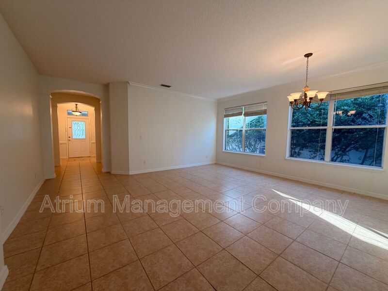 Charming 3BR Winter Garden Home | Spacious Layout, Preserve View & Screened Patio property image