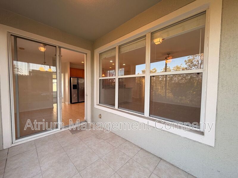 Charming 3BR Winter Garden Home | Spacious Layout, Preserve View & Screened Patio property image