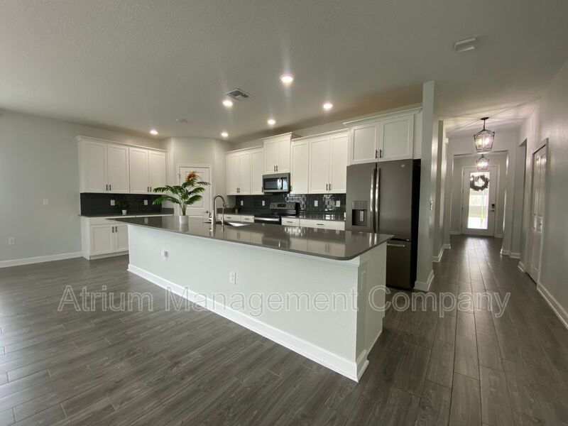 Spacious 5 Bedroom Pool Home with In-Law Suite in Lake Nona’s Coveted Storey Park! property image