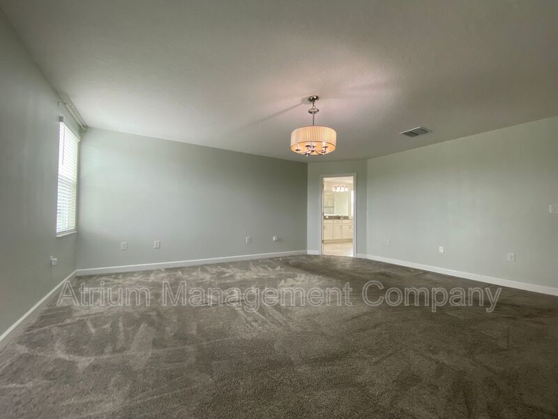 Spacious 5 Bedroom Pool Home with In-Law Suite in Lake Nona’s Coveted Storey Park! property image