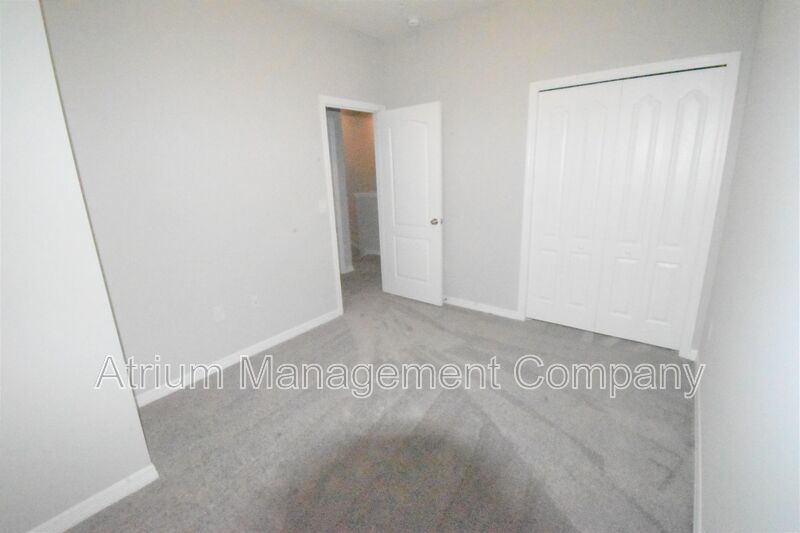 PREMIUM NEW CONSTRUCTION TOWN HOME IN TOWNS AT WHITE CEDAR property image